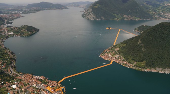 “The Floating Piers” a giant art installation on Lake Iseo in Italy is letting people walk on water